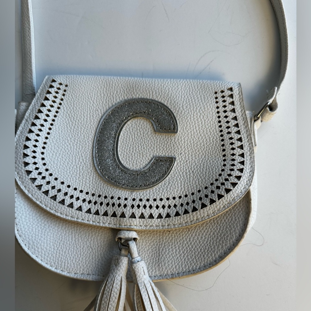 Justice White Leatherette Girls Crossbody Bag with Tassel and C monogram